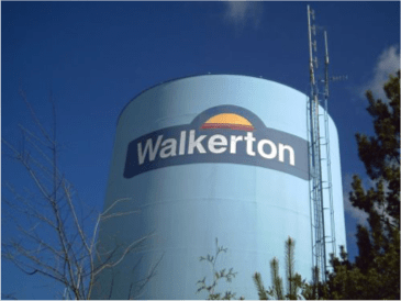 The Walkerton water tower rises above the treetops